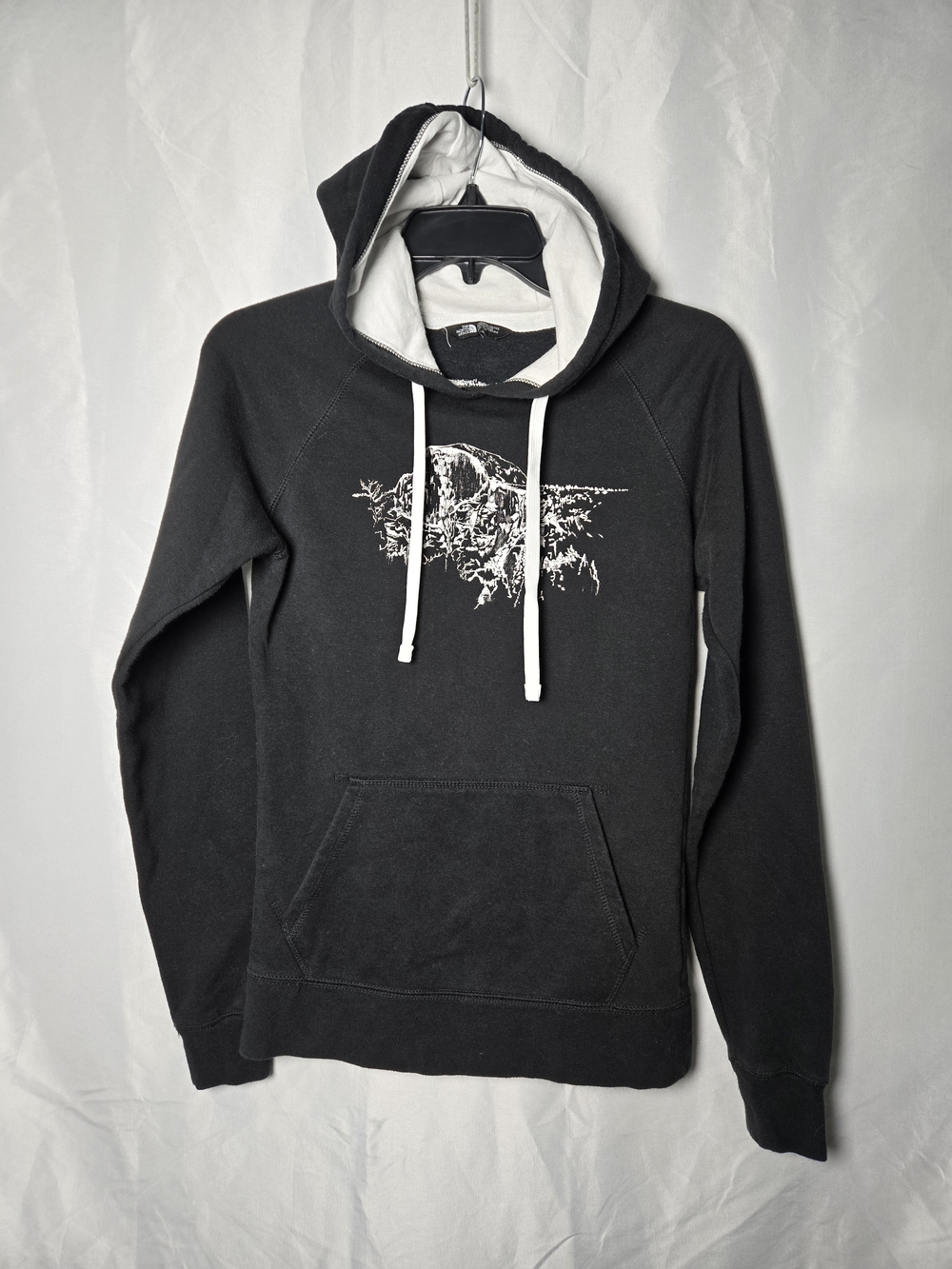 The North Face Black Hoodie with White Graphic and Lined Hood